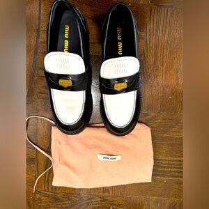 Miu Miu two-tone calf leather penny loafers with logo coin accent